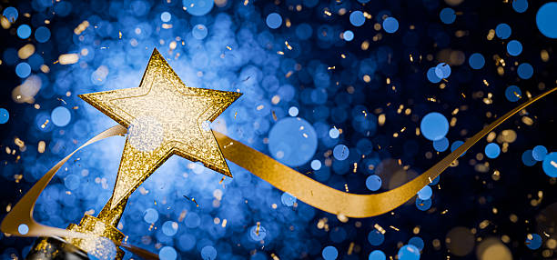 Winners Cup. Top Performance Award. Victory. Achievements. First place in a computer game. Winner certificate. Gold star on a blue background as a reward. Goal achievement concept. 3D render.