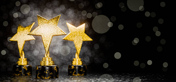 Winner's Cup. Award for outstanding achievement. Victory. Achievements. First place in a computer game. Winner's certificate. A gold star festive background as a reward. Goal achievement. 3D render.