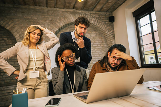 istock Diverse business team worried while looking at laptop 2254740687
