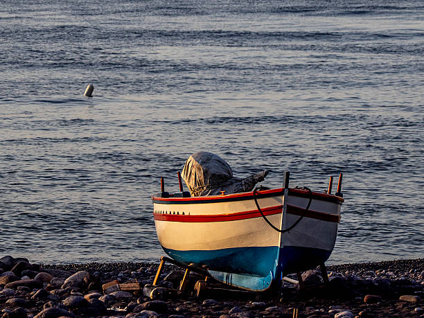 Stromboli, Isole Eolie, Sicilia, Italia:Wooden boat on Stromboli beach