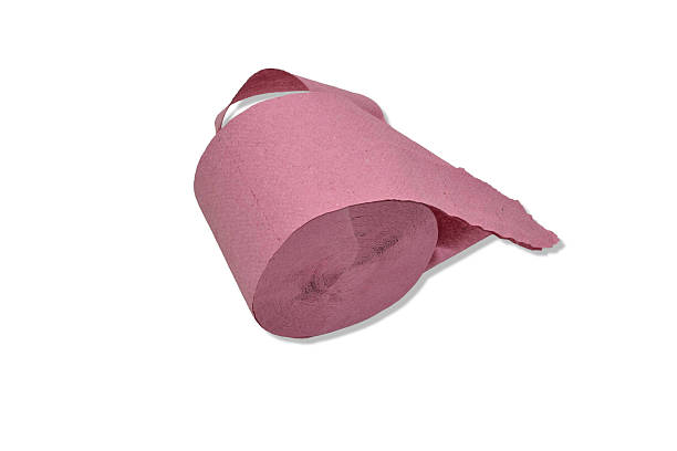 Red toilet paper roll isolated on white background.