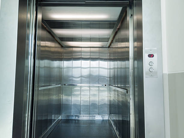 istock Empty elevator cabin with shiny metal walls 2254746271
