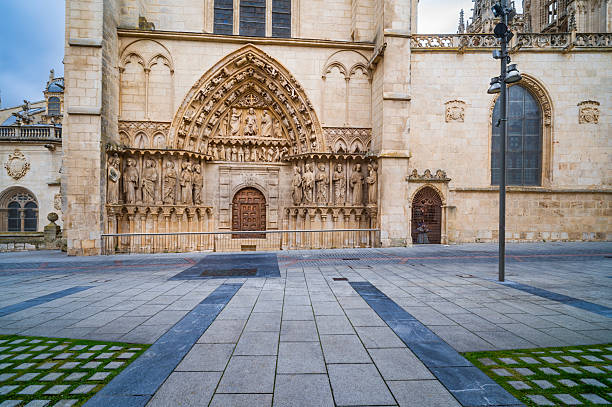 Burgos Cathedral showing the elaborate gothic architecture of the Sarmental Gate facade with sculpted figures, an iconic landmark and UNESCO World Heritage Site in Spain