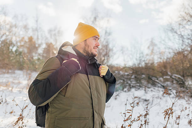 istock Solitude in Snow American Backpacker Tranquil Wintertime Trek 2254752151