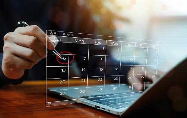 istock Business professional planning schedule on digital calendar interface marking important date on virtual planner over laptop concept of time management productivity, deadline modern work organization 2254752161