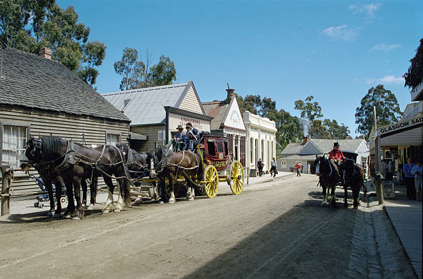 Historical photograph from 2001: Tourists stroll through the historic mining settlement at Sovereign Hill in Ballarat, Australia.