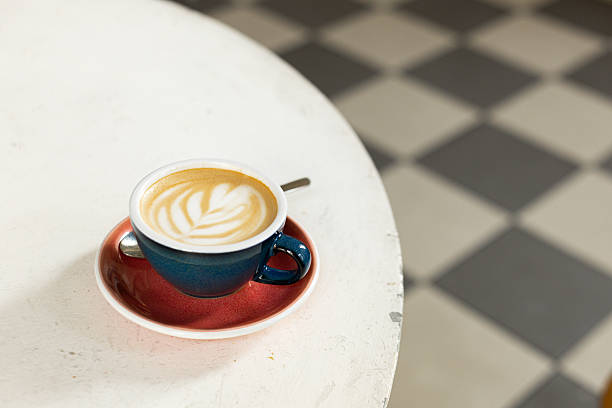istock Coffee cappuccino cup with latte art on white table 2254759714
