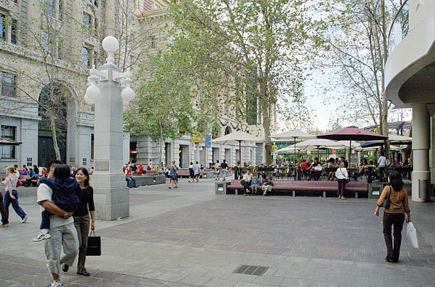 Historical photo from 2001: Tourists and locals stroll across Forrest Place, a prominent public square in downtown Perth, Western Australia.