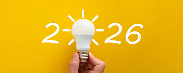 istock Hand holding lightbulb forming 2026 new idea concept 2254766451