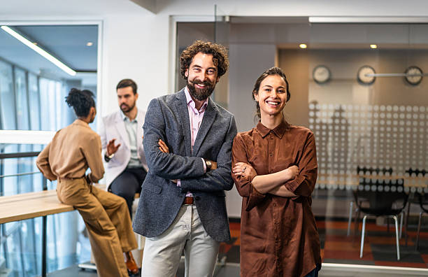 istock Diverse business team smiling in modern office 2254766761