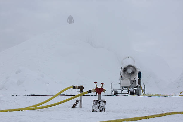 Water hoses connected to snow cannon to make snow. Stockholm 010724