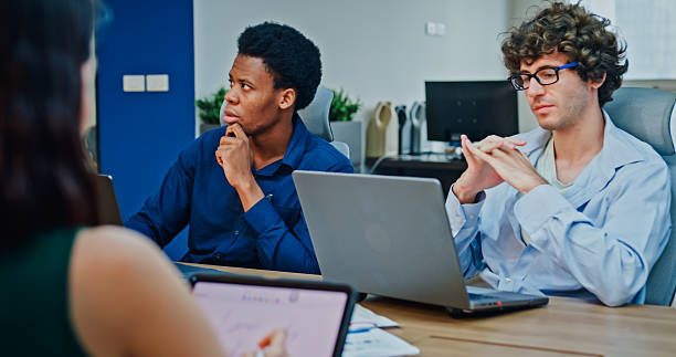istock Diverse business team presents company data and performance charts meeting discussing strategy planning investment marketing strategies in modern office. Sustainable business and finance concept. 2254772874