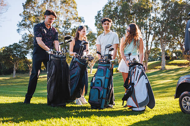 istock Delighted Young Caucasian Individuals Arranging Golf Equipment 2254776709