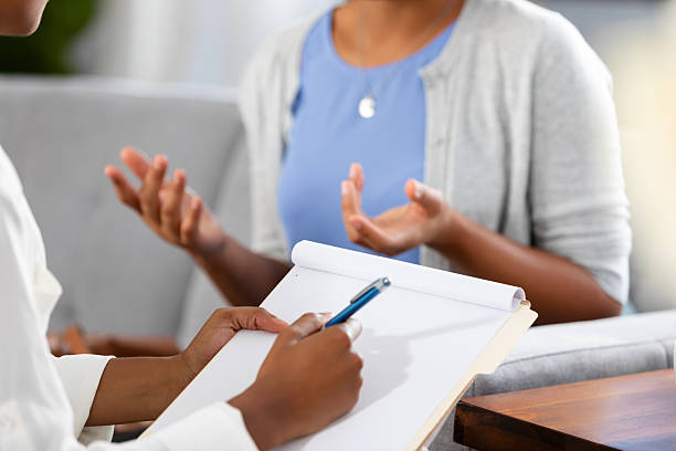 istock Two women engaged in a therapy session, discussing issues and receiving support. 2254781446