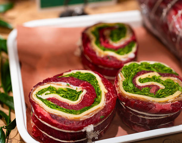 Rolled Beef Pinwheels Stuffed with Greens and Cheese