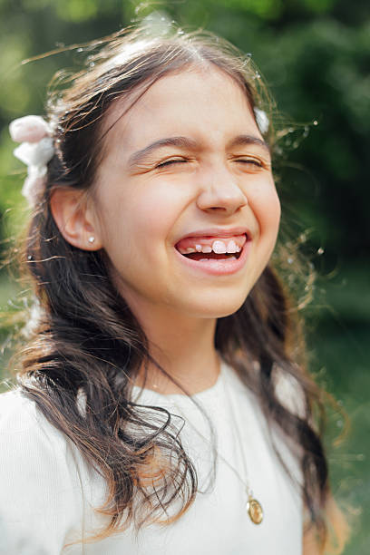 White T-shirt andmdresses, all in amazing and beautiful family atmosphere. Children with big smiles and positive energy making vineyard look as heaven on Earth. Mother is always there to make everything even better. With flowers on girls head.