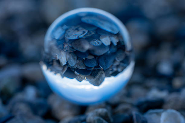 Creative lens ball reflection of smooth pebbles