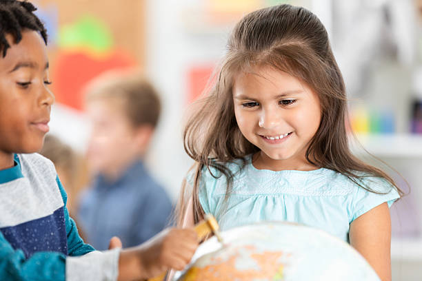 istock Young children explore the world together, learning and sharing in a classroom setting. 2254792987