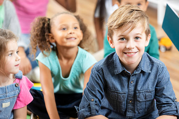 istock Diverse young children in a classroom setting, engaged and happy during a lesson. 2254793001