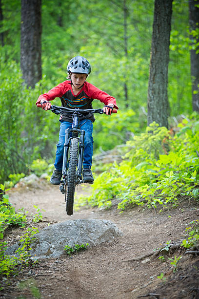 istock Mountain Bike Boy Jumping 2254795151