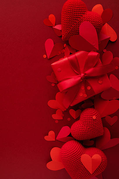 istock Valentine day romantic vertical background with red love hearts and gift box top view. 2254796431