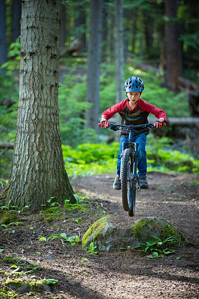 istock Mountain Bike Boy Jumping off a Rock 2254797245
