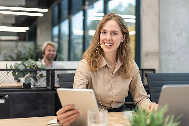 istock Freelance business women using tablet working call video conference with customer in workplace at office 2254798007