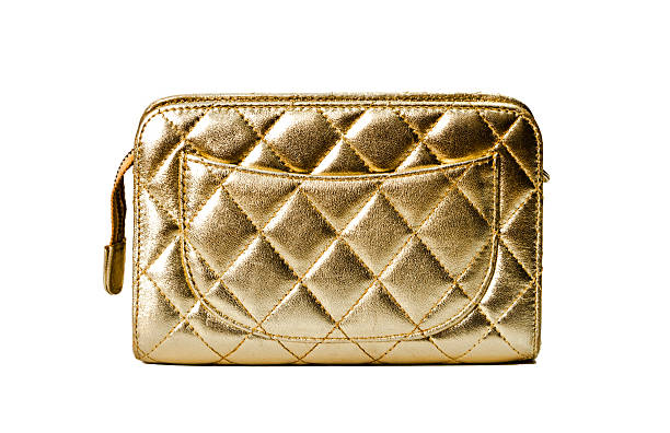istock Luxury gold quilted leather clutch wallet isolated on white background studio shot 2254806787