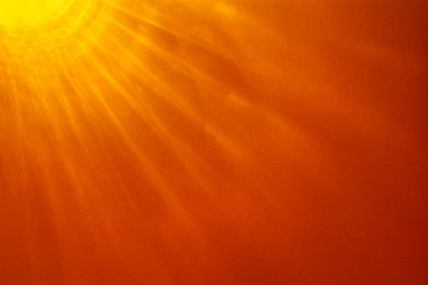 Paper abstraction. Play of light and shadow on orange cardboard. Colored cardboard. Abstract background