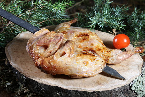 fried meat with potatoes and vegetables
