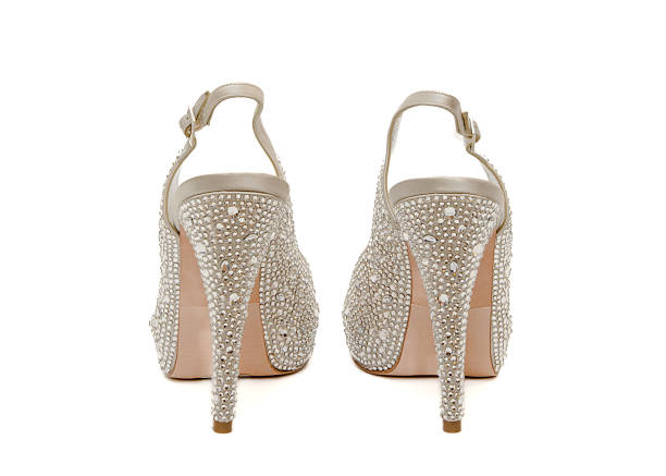 Luxury women’s high heel platform sandals featuring champagne and silver tones with crystal rhinestone embellishments and slingback design photographed from front side and rear angles isolated on white background for fashion footwear retail e commerce and luxury style concepts