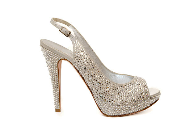 Luxury women’s high heel platform sandals featuring champagne and silver tones with crystal rhinestone embellishments and slingback design photographed from front side and rear angles isolated on white background for fashion footwear retail e commerce and luxury style concepts