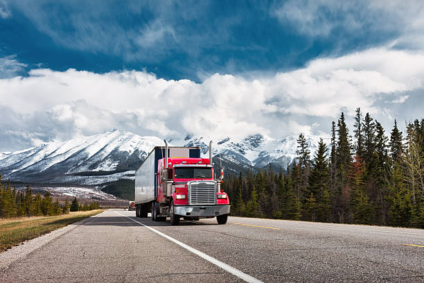 istock Semi Truck Drives Highway Alberta Canada Freight Transportation 2254822644