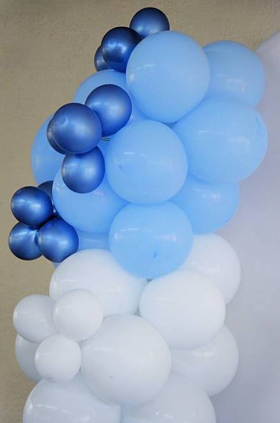 istock Decoration with dark blue, light blue, and white balloons for a party. 2254822827