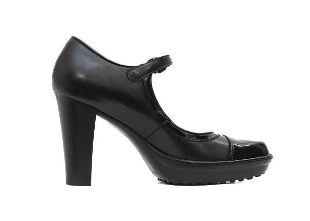 Elegant black Mary Jane style high heel shoes with thick platform sole and rounded toe design photographed in studio on a clean white background featuring glossy leather texture adjustable strap and chunky heel suitable for fashion retail catalog vintage inspired footwear concepts and luxury womens style without people and with copy space