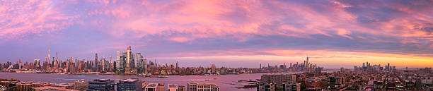 istock Panoramic Manhattan skyline at sunset over Hudson River 2254823136