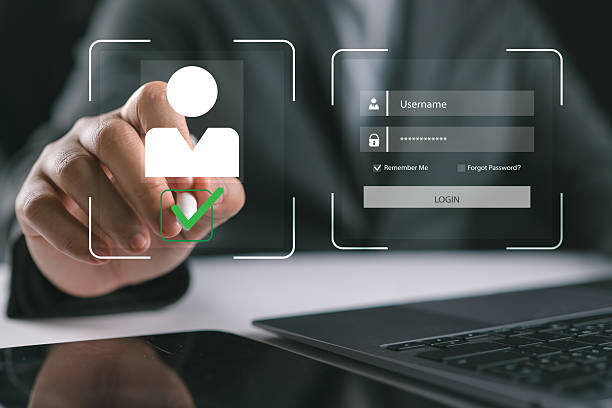 istock Businessman Digital Identity Verification, Hand holding stylus interacts with virtual security interface, Laptop background. 2254823379
