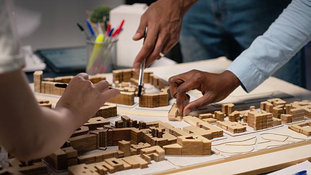 istock Close up of engineers team creating the property layout for site preparation 2254824523