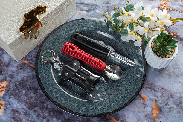 istock Everyday home utensils on dark marble background 2254825448