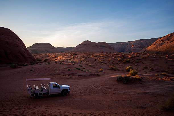 istock Tourism vehicule in sunrise light in Monument Valley 2254830895