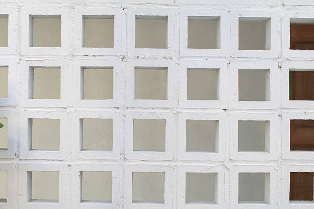 White brick walls with square holes. Minimal Architectural background. Modern industrial.