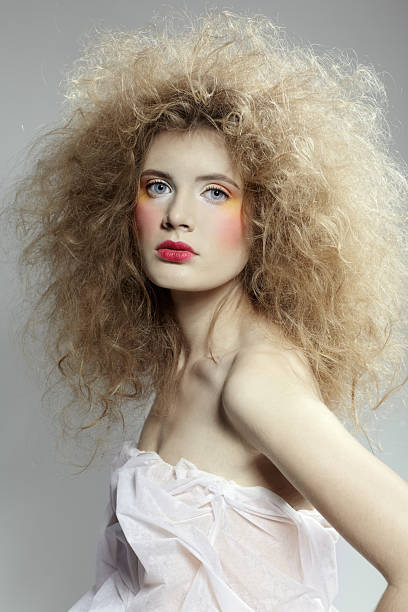 istock girl with shock hair-do 2254836858