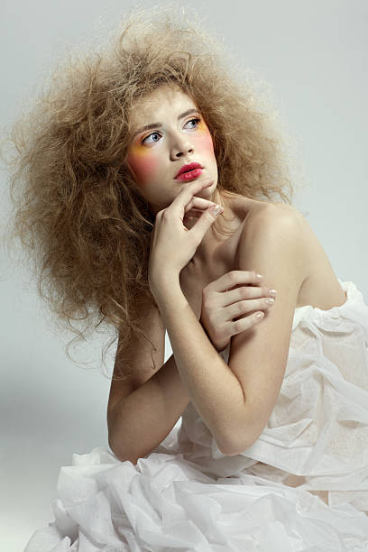 istock girl with shock hair-do 2254836933