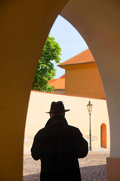 Czechia, Prague, old tow district man walking visiting