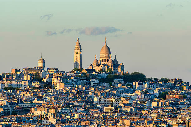 istock Sacre Coeur basilica above Montmartre rooftops at sunset 2254840342