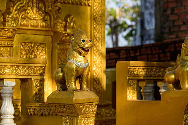 Shot in color detail on the facade of this historic building representing some character, animal or flower. Set at Siem Reap, Angkor Wat , Cambodia, Asia