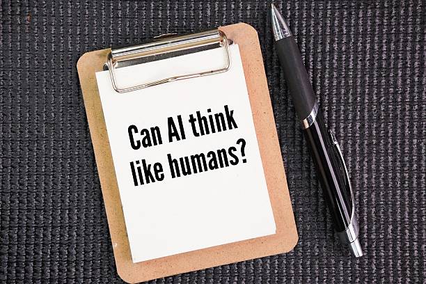 istock Pen and paper chalkboard with the question words Can AI think like humans? 2254846549