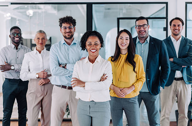 istock Confident businesswoman and her team. 2254861188