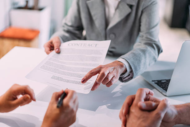 istock Business people signing a contract in the office. 2254861473
