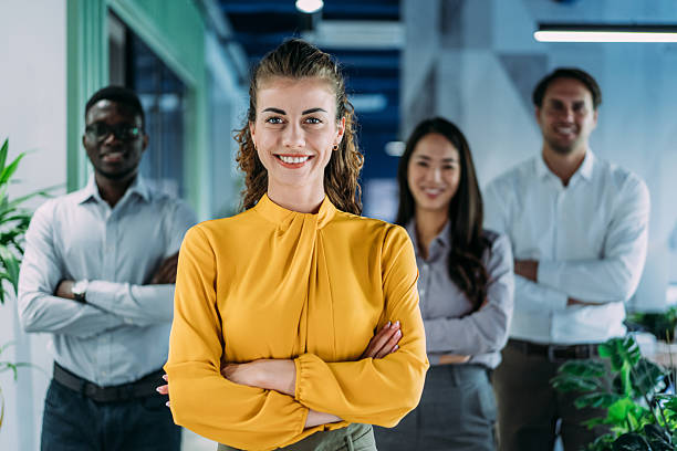 istock Confident businesswoman and her team. 2254861561
